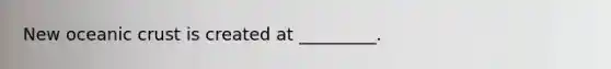 New oceanic crust is created at _________.