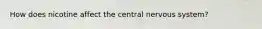 How does nicotine affect the central nervous system?