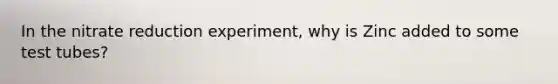 In the nitrate reduction experiment, why is Zinc added to some test tubes?