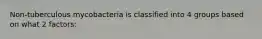 Non-tuberculous mycobacteria is classified into 4 groups based on what 2 factors: