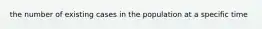 the number of existing cases in the population at a specific time
