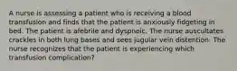 A nurse is assessing a patient who is receiving a blood transfusion and finds that the patient is anxiously fidgeting in bed. The patient is afebrile and dyspneic. The nurse auscultates crackles in both lung bases and sees jugular vein distention. The nurse recognizes that the patient is experiencing which transfusion complication?