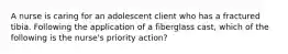 A nurse is caring for an adolescent client who has a fractured tibia. Following the application of a fiberglass cast, which of the following is the nurse's priority action?