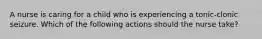A nurse is caring for a child who is experiencing a tonic-clonic seizure. Which of the following actions should the nurse take?