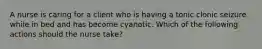 A nurse is caring for a client who is having a tonic clonic seizure while in bed and has become cyanotic. Which of the following actions should the nurse take?