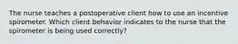 The nurse teaches a postoperative client how to use an incentive spirometer. Which client behavior indicates to the nurse that the spirometer is being used correctly?