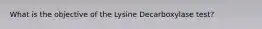 What is the objective of the Lysine Decarboxylase test?