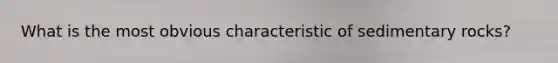What is the most obvious characteristic of sedimentary rocks?