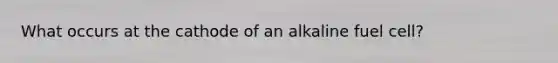 What occurs at the cathode of an alkaline fuel cell?