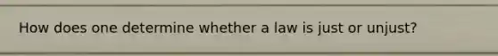 How does one determine whether a law is just or unjust?