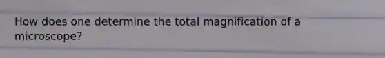 How does one determine the total magnification of a microscope?