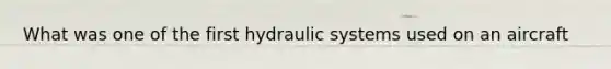 What was one of the first hydraulic systems used on an aircraft