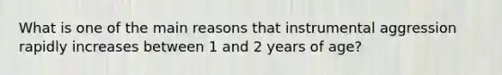 What is one of the main reasons that instrumental aggression rapidly increases between 1 and 2 years of age?