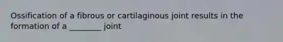 Ossification of a fibrous or cartilaginous joint results in the formation of a ________ joint