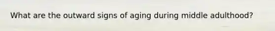 What are the outward signs of aging during middle adulthood?