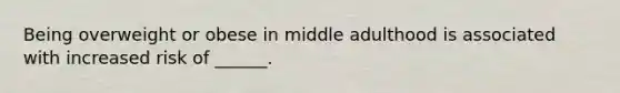 Being overweight or obese in middle adulthood is associated with increased risk of ______.