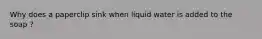 Why does a paperclip sink when liquid water is added to the soap ?