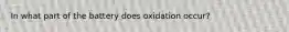 In what part of the battery does oxidation occur?