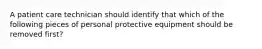 A patient care technician should identify that which of the following pieces of personal protective equipment should be removed first?