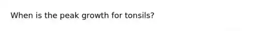 When is the peak growth for tonsils?