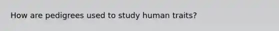 How are pedigrees used to study human traits?