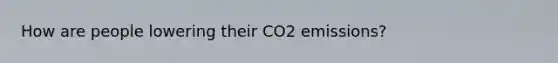 How are people lowering their CO2 emissions?