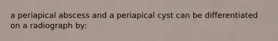 a periapical abscess and a periapical cyst can be differentiated on a radiograph by: