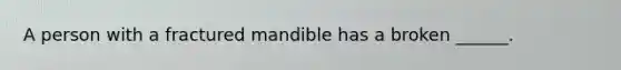 A person with a fractured mandible has a broken ______.