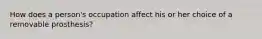 How does a person's occupation affect his or her choice of a removable prosthesis?