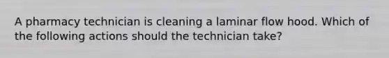 A pharmacy technician is cleaning a laminar flow hood. Which of the following actions should the technician take?