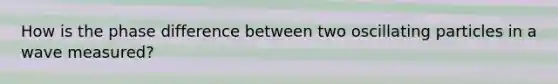 How is the phase difference between two oscillating particles in a wave measured?