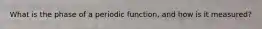 What is the phase of a periodic function, and how is it measured?