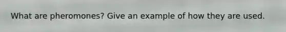 What are pheromones? Give an example of how they are used.