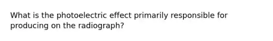 What is the photoelectric effect primarily responsible for producing on the radiograph?