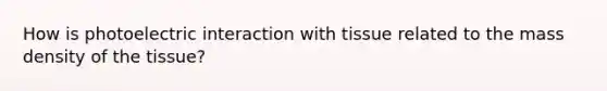 How is photoelectric interaction with tissue related to the mass density of the tissue?