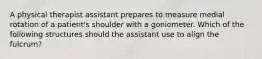 A physical therapist assistant prepares to measure medial rotation of a patient's shoulder with a goniometer. Which of the following structures should the assistant use to align the fulcrum?