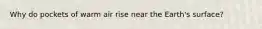 Why do pockets of warm air rise near the Earth's surface?