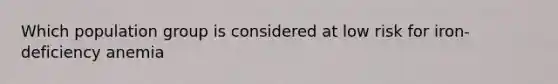 Which population group is considered at low risk for iron-deficiency anemia
