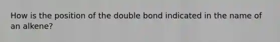 How is the position of the double bond indicated in the name of an alkene?