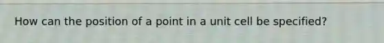 How can the position of a point in a unit cell be specified?