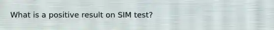 What is a positive result on SIM test?