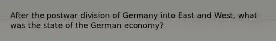 After the postwar division of Germany into East and West, what was the state of the German economy?