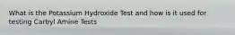 What is the Potassium Hydroxide Test and how is it used for testing Carbyl Amine Tests