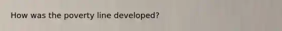 How was the poverty line developed?