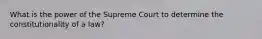 What is the power of the Supreme Court to determine the constitutionality of a law?