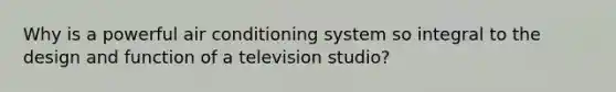 Why is a powerful air conditioning system so integral to the design and function of a television studio?