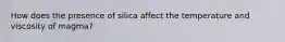 How does the presence of silica affect the temperature and viscosity of magma?