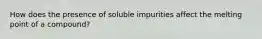 How does the presence of soluble impurities affect the melting point of a compound?