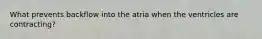 What prevents backflow into the atria when the ventricles are contracting?