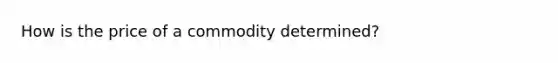 How is the price of a commodity determined?